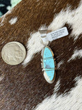 Brandon Etcity Navajo handmade sterling silver Kingman turquoise pendant