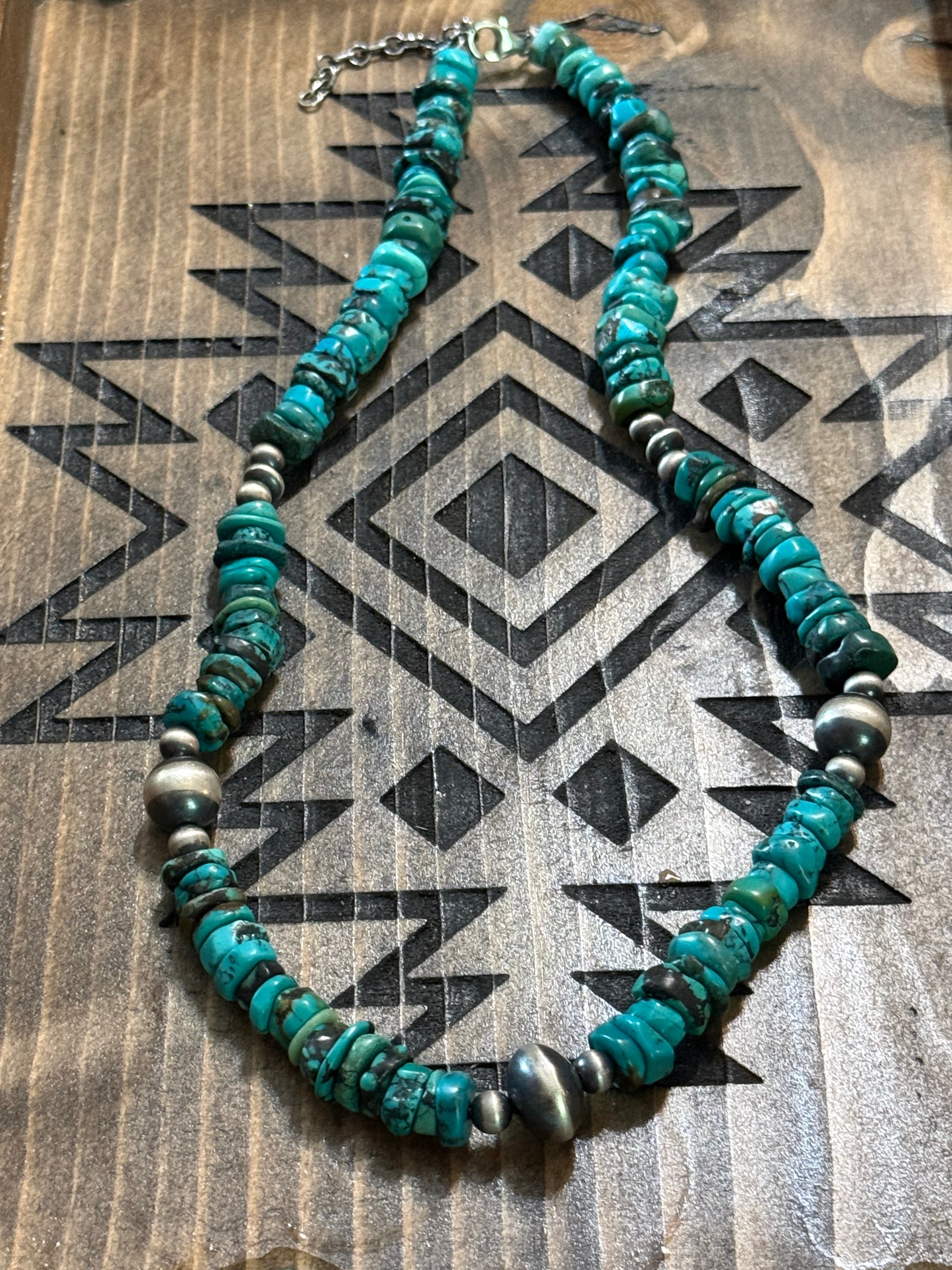 Turquoise chip necklace with sterling silver beads with saucer bead