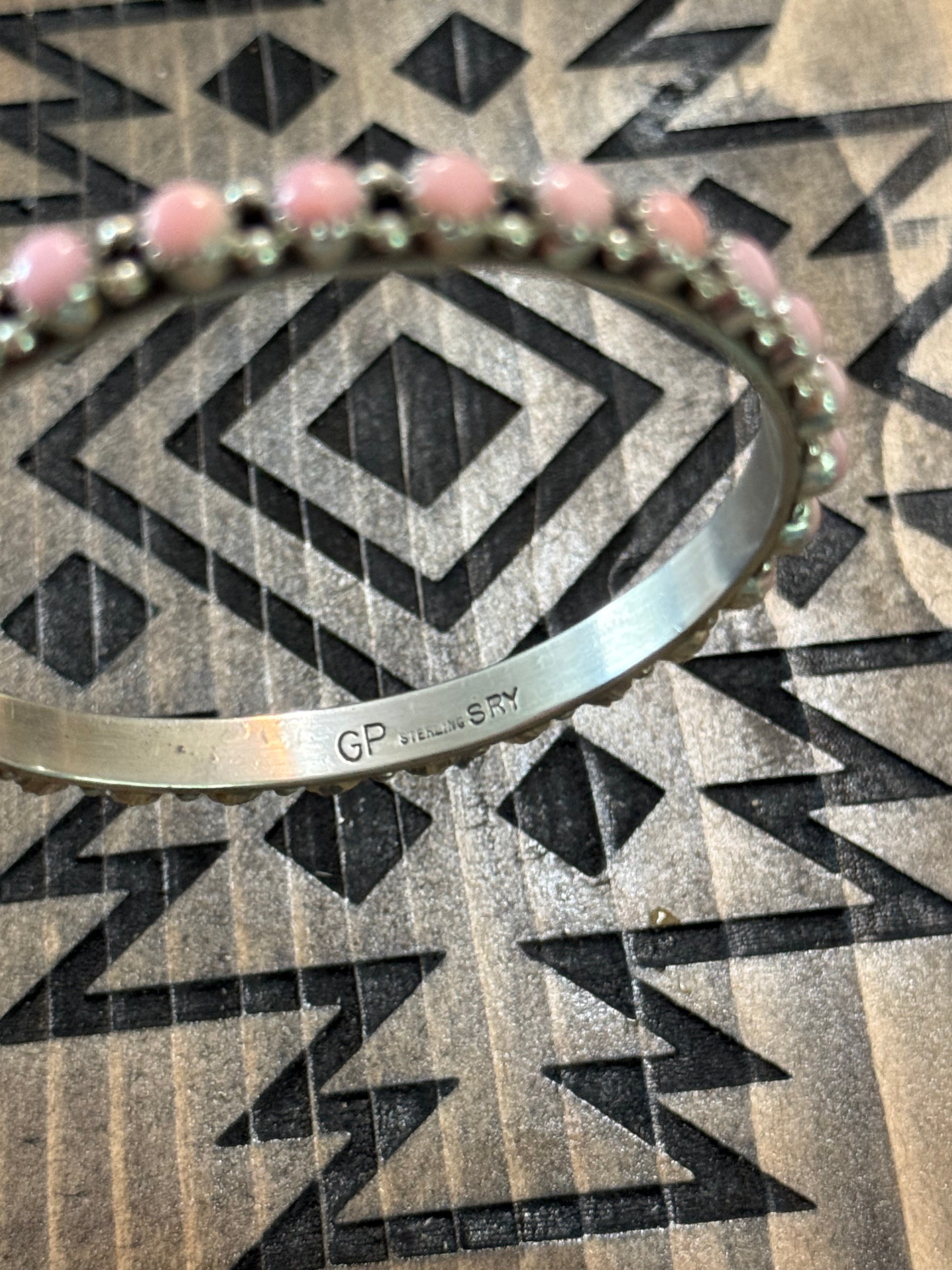 Native pink conch bangle stamped GP & SRY