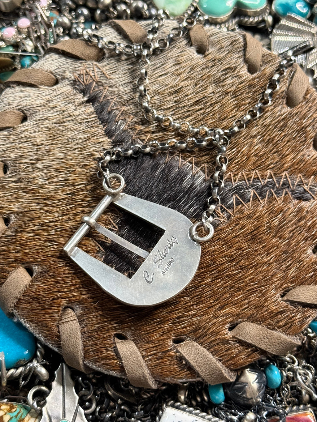Native C. Shorty stamped turquoise buckle necklace