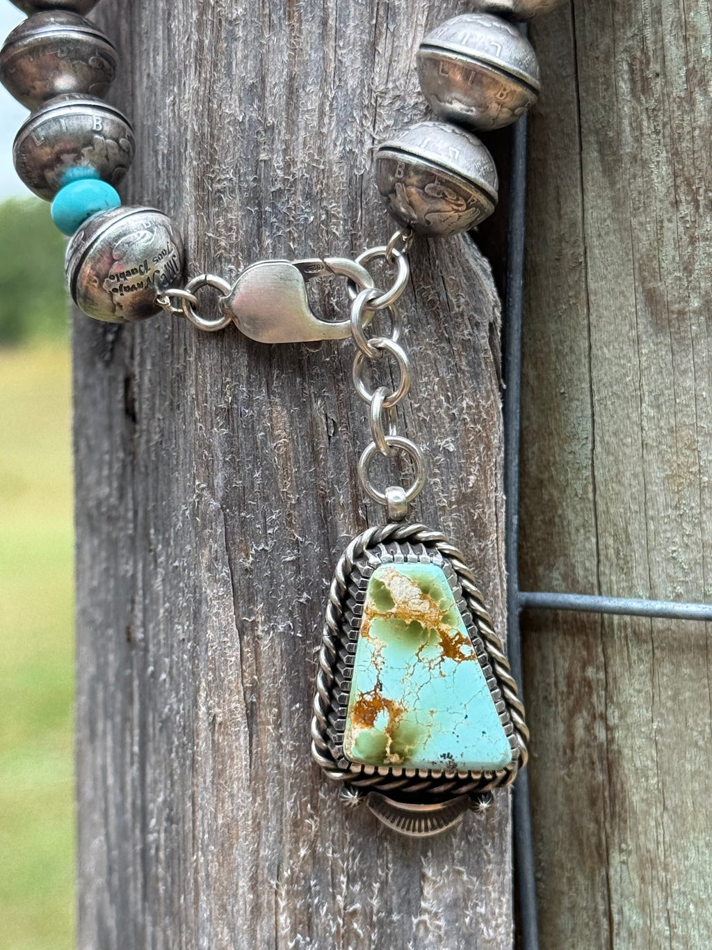 James McCabe Mercury dime bracelet with turquoise charm