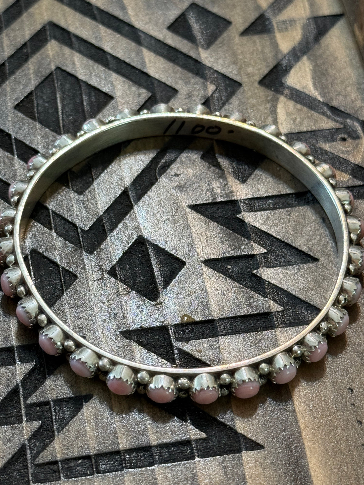 Native pink conch bangle stamped GP & SRY