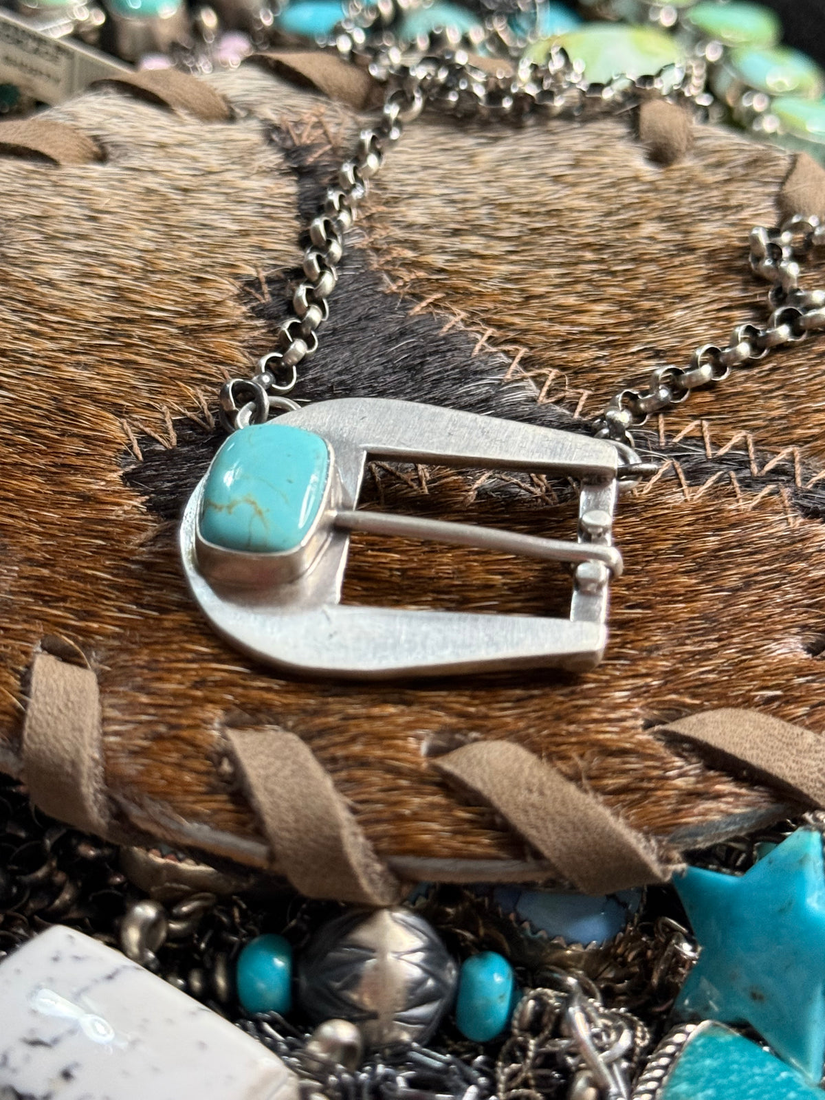 Native C. Shorty stamped turquoise buckle necklace