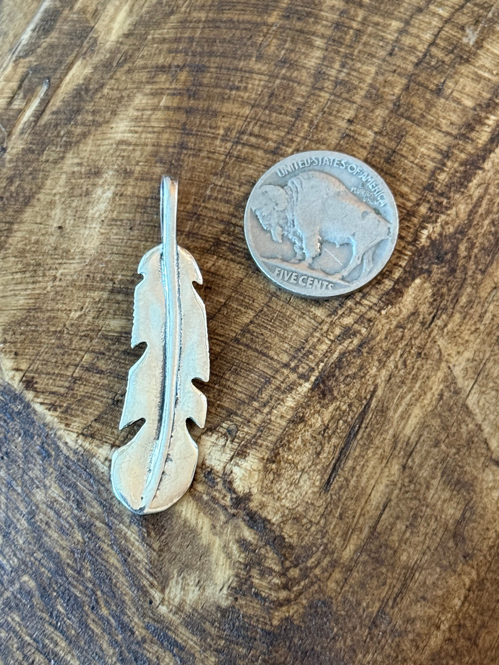 Turquoise feather pendant