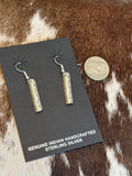 Leander Tahe dangles