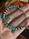 The perfect turquoise and sterling silver pearl stacker bracelet