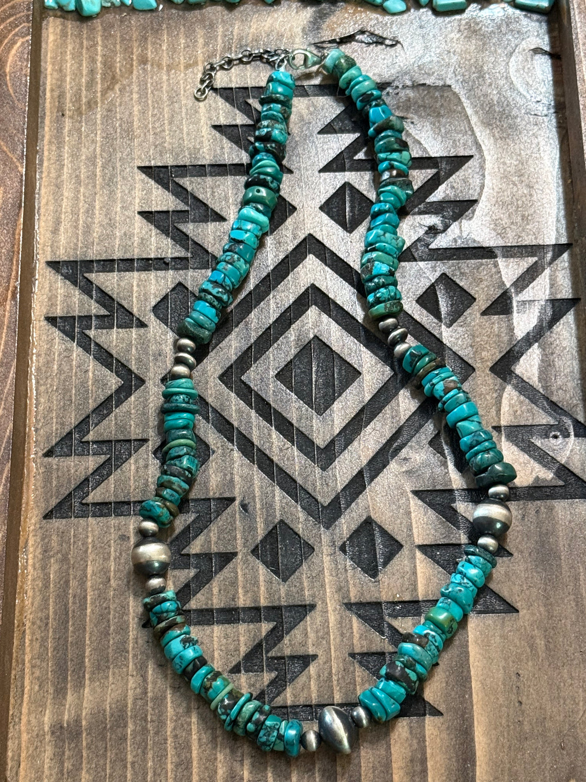 Turquoise chip necklace with sterling silver beads with saucer bead