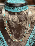 Vintage 12 strand liquid silver and turquoise necklace