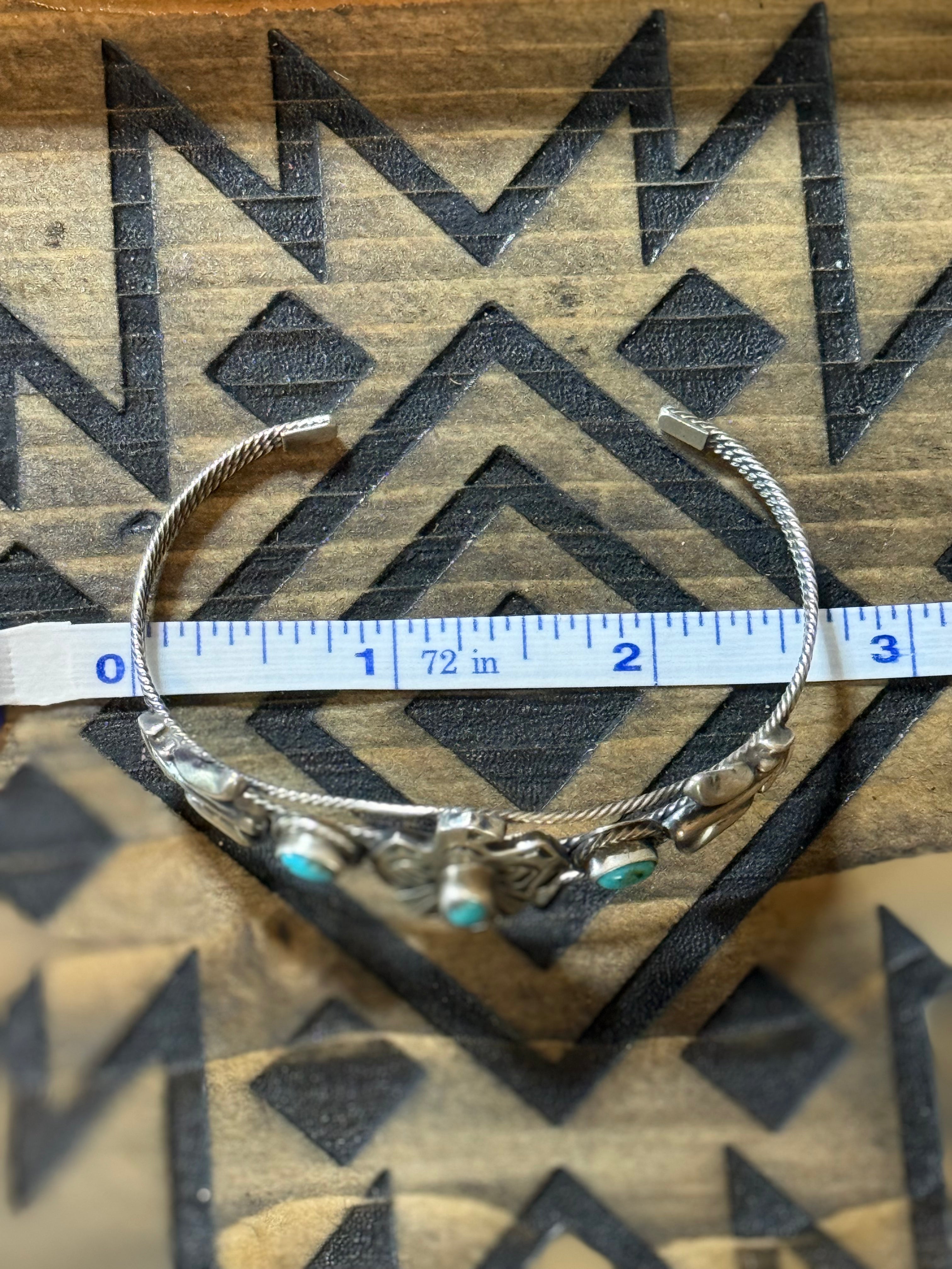 Native Bobby Platero native made Thunderbird turquoise cuff