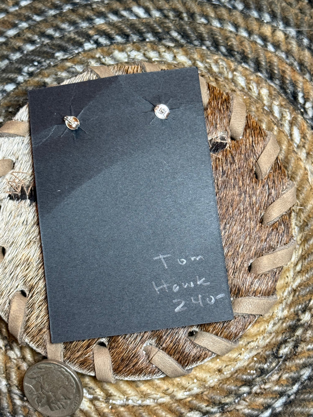 Tom Hawk dangles