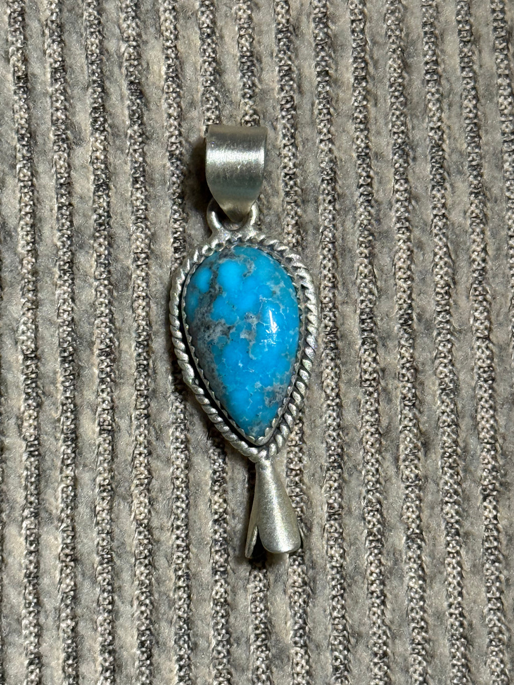 Turquoise and sterling silver blossom pendant