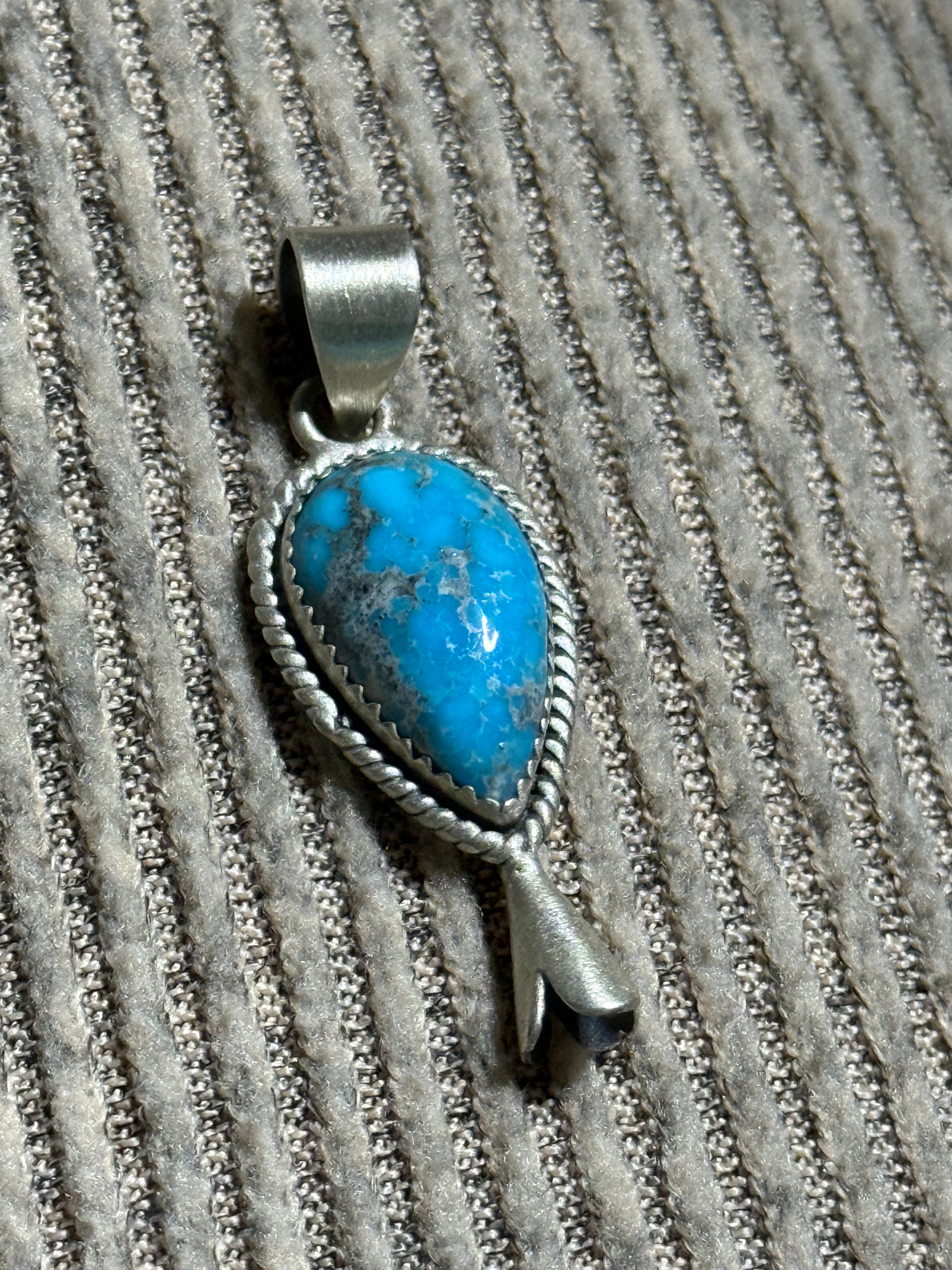 Turquoise and sterling silver blossom pendant
