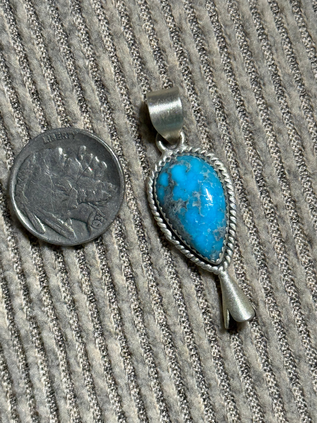 Turquoise and sterling silver blossom pendant