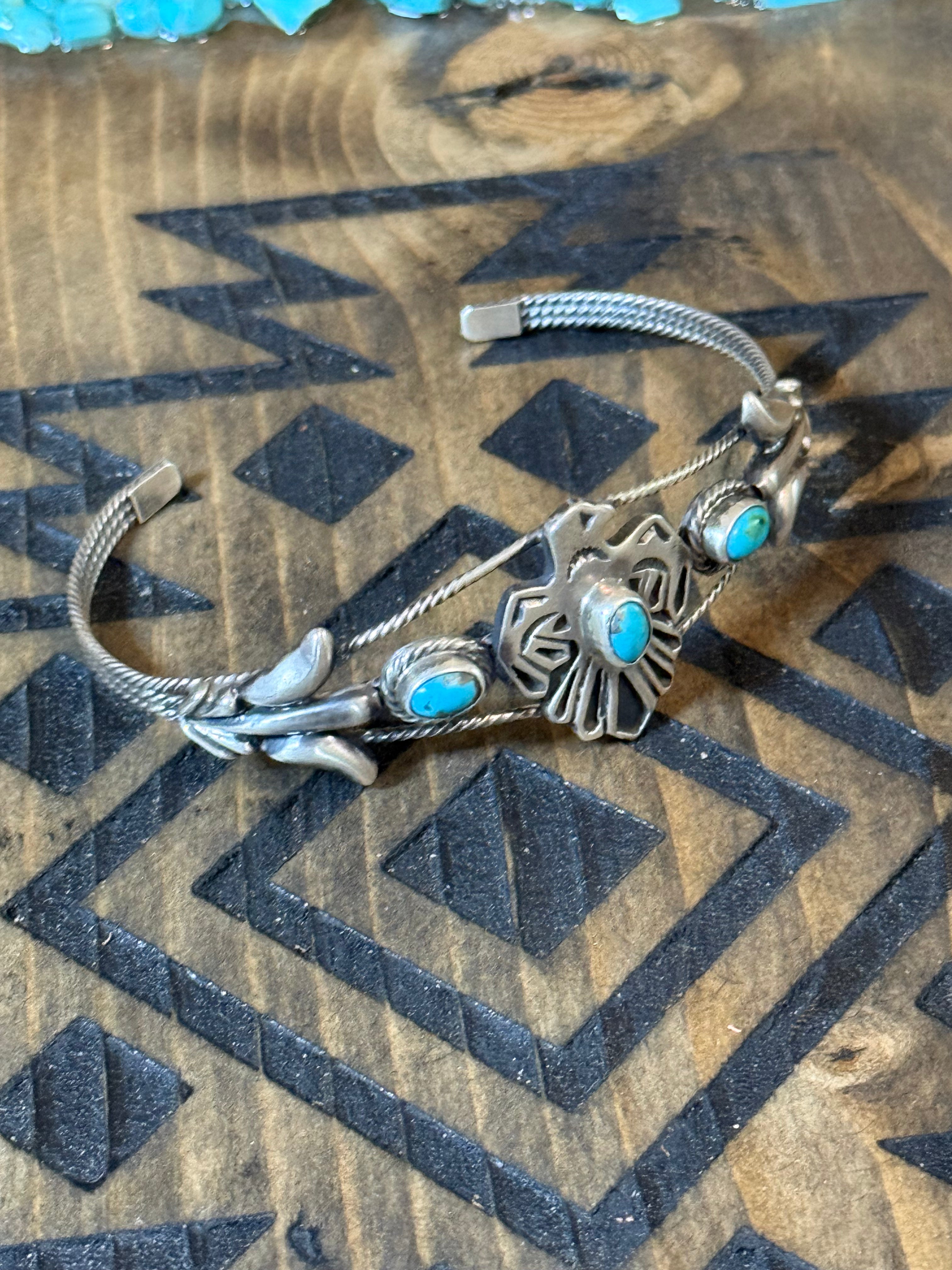 Native Bobby Platero native made Thunderbird turquoise cuff