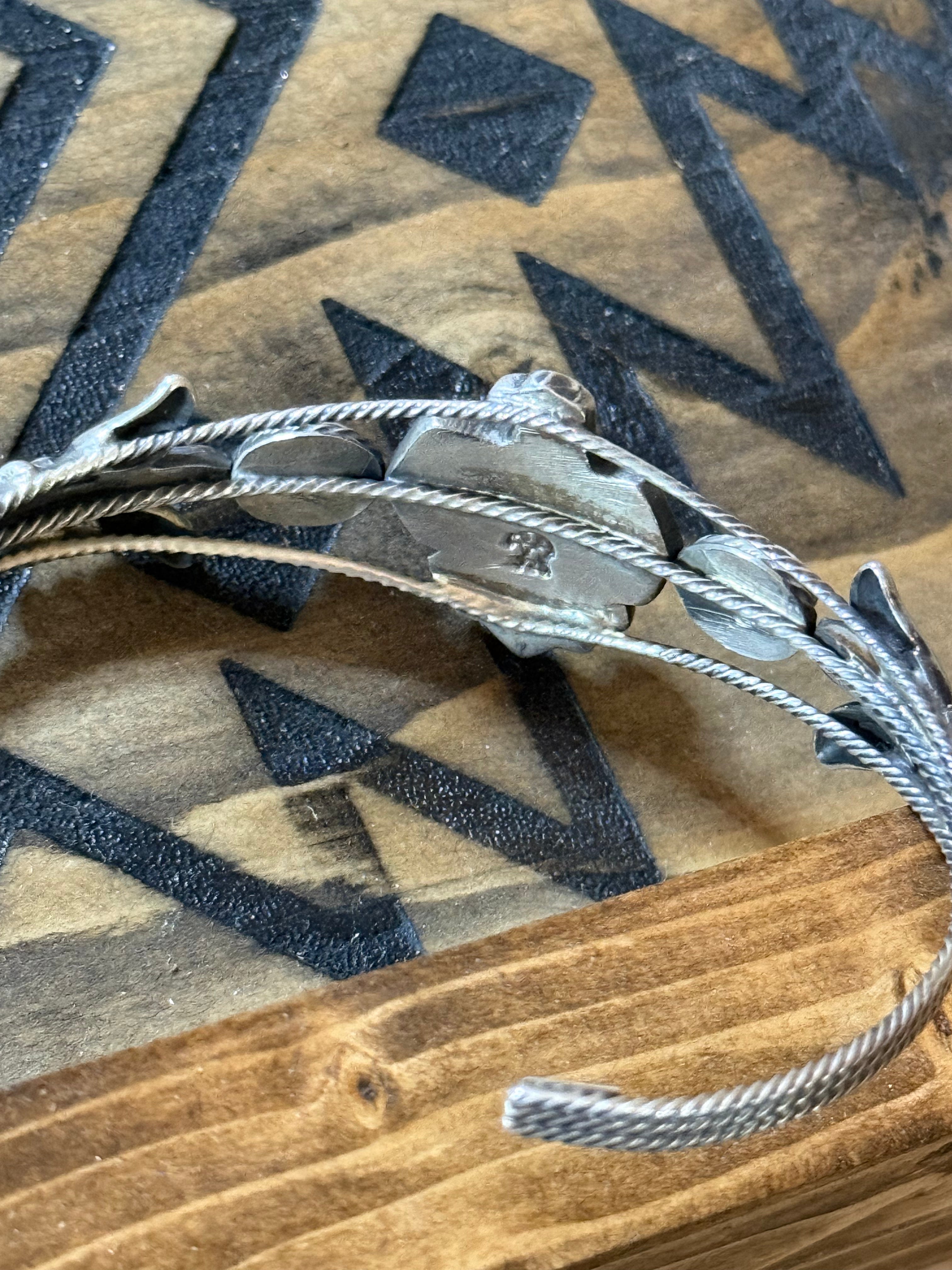 Native Bobby Platero native made Thunderbird turquoise cuff
