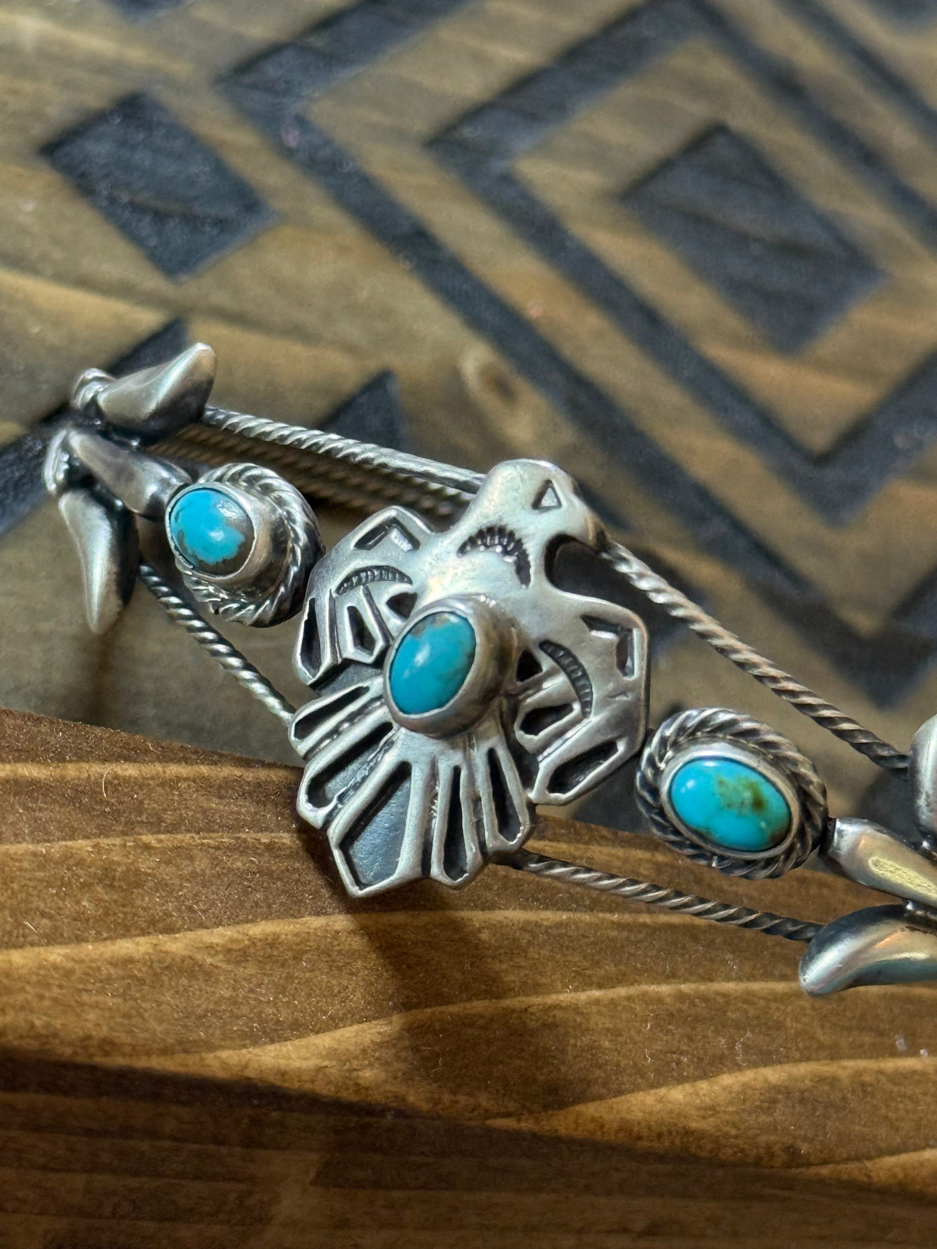 Native Bobby Platero native made Thunderbird turquoise cuff
