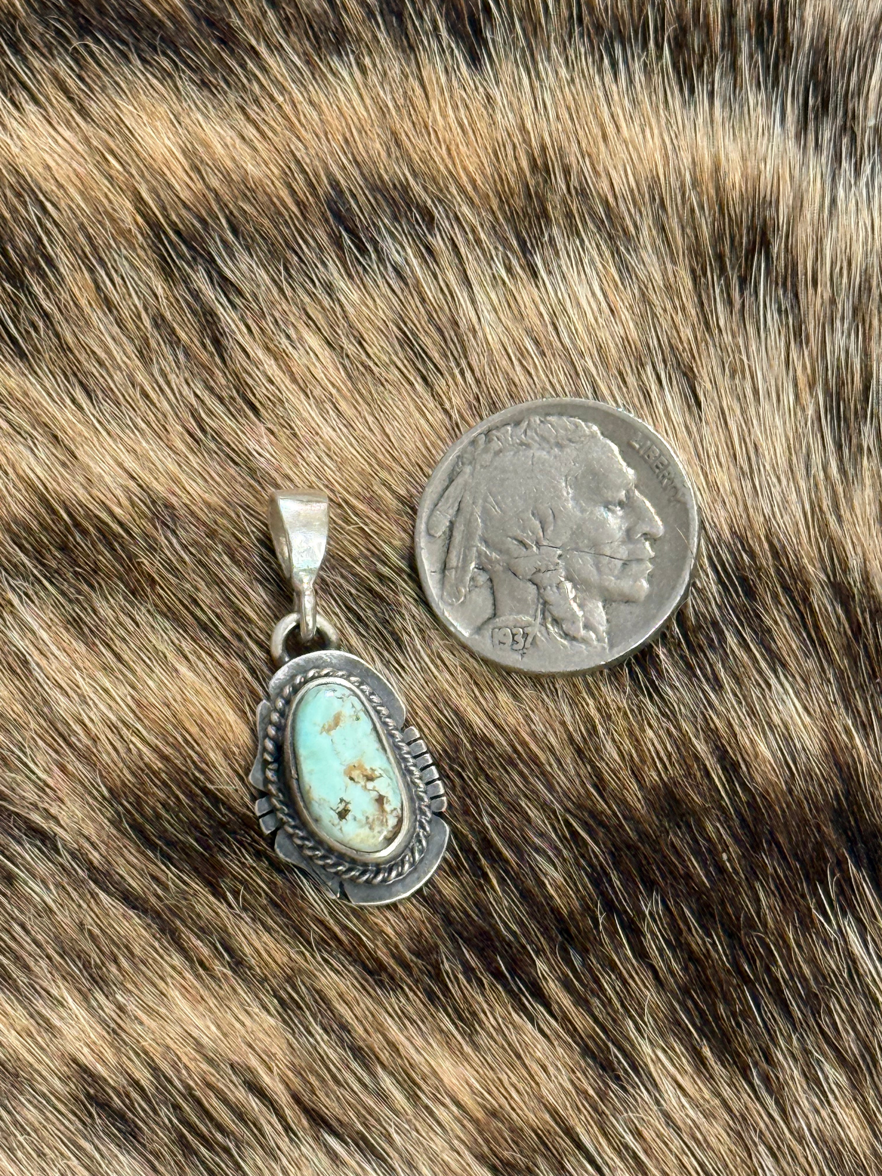 Native made dry creek turquoise pendant