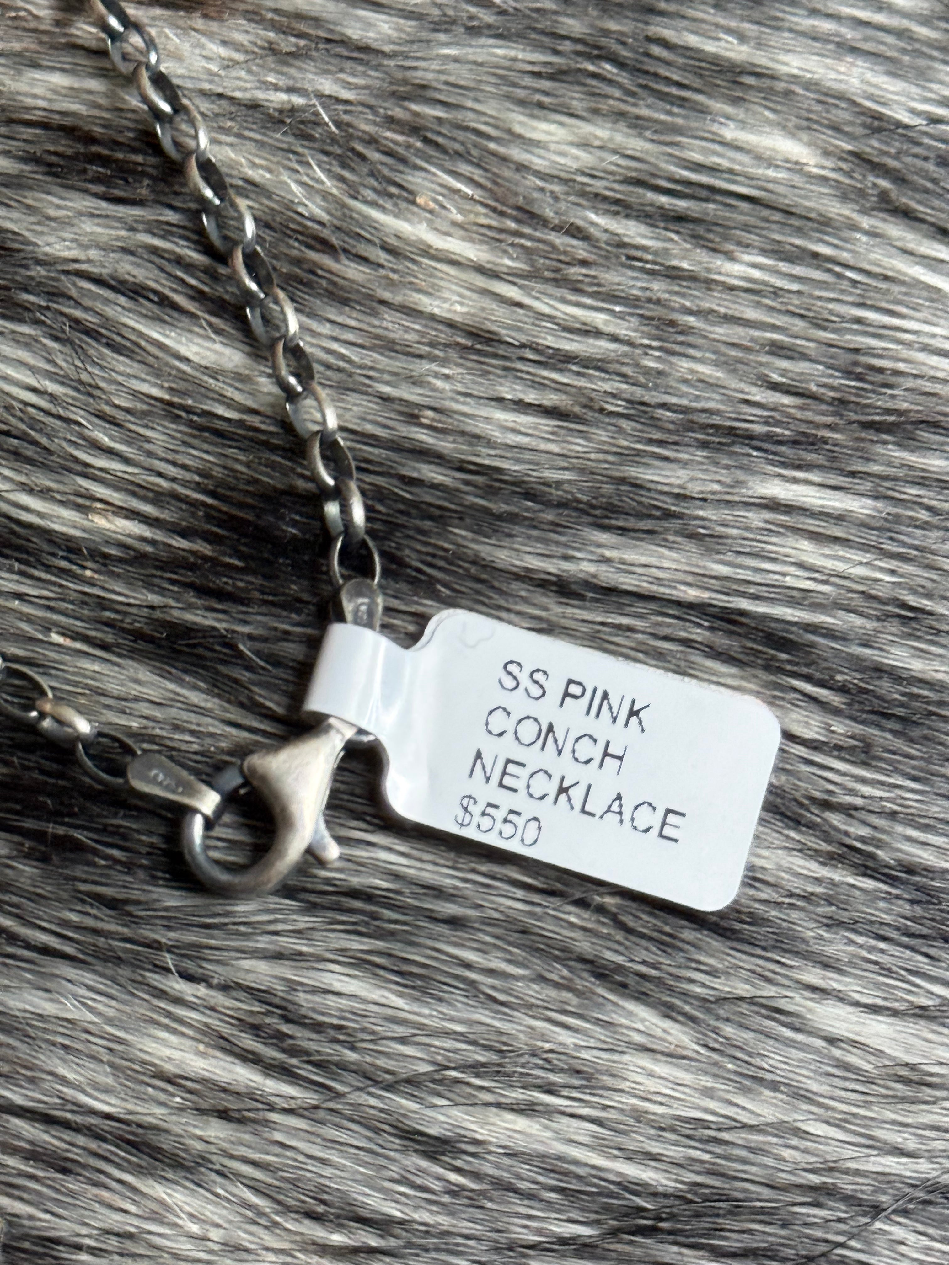 Zuni pink conch and sterling silver necklace by Phyllis Laate